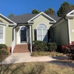 Raleigh home with new green James Hardie siding, front zoomed